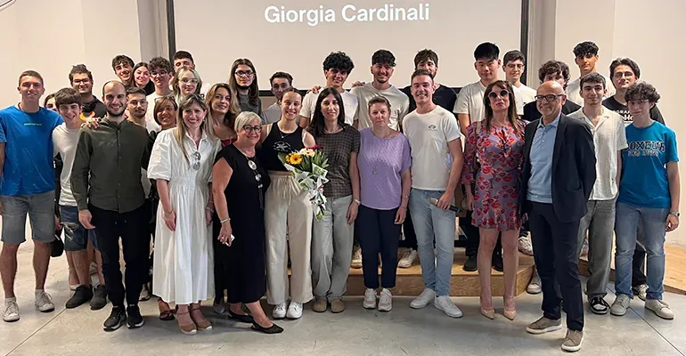 Students and teachers from both schools with Christian Vari and the 2025 winner, Giorgia Cardinali